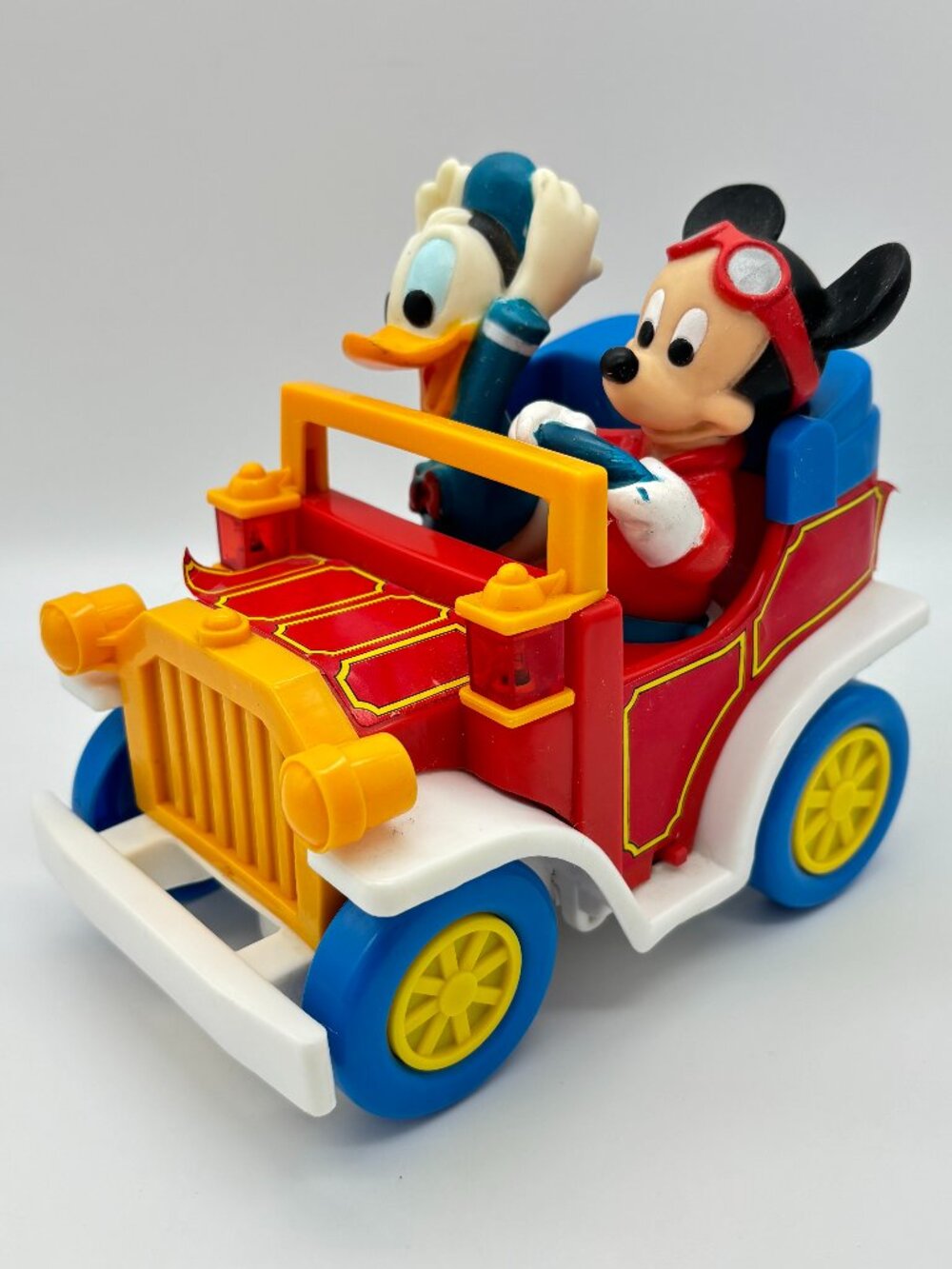 Vintage Walt Disney Mickey Mouse Donald Duck 7.5" Plastic Battery Toy Car Illco